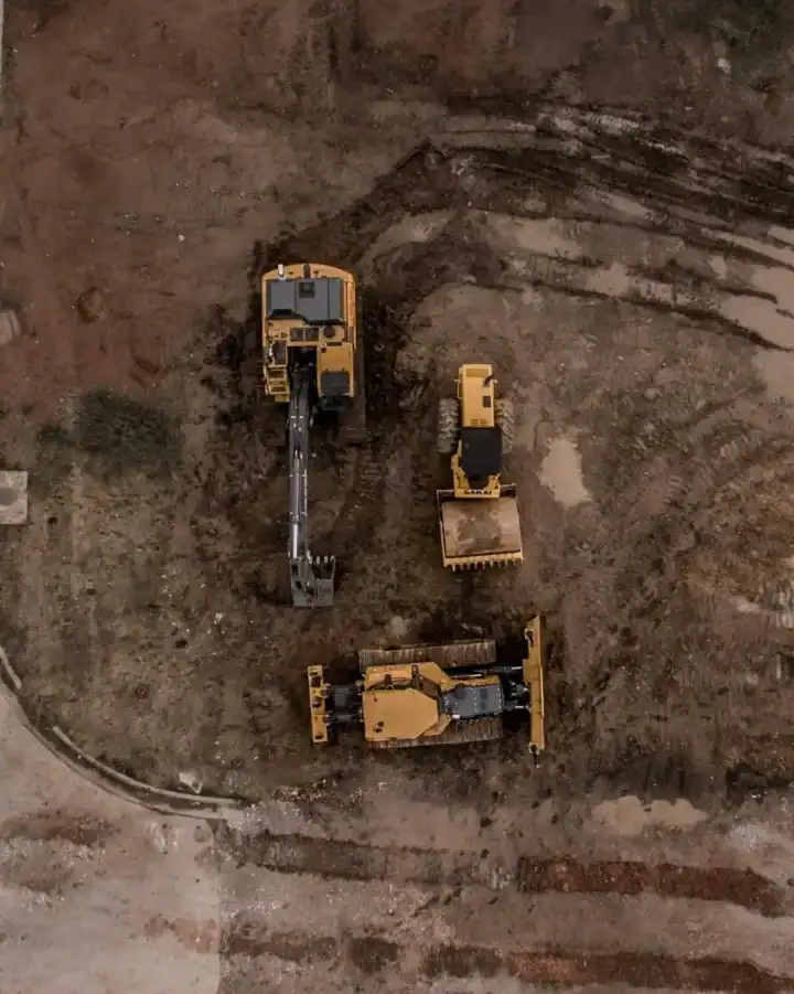 parked diggers and construction plant
